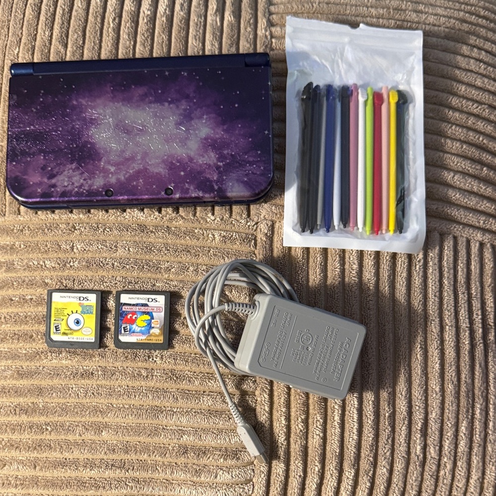 Nintendo 3DS XL in Cosmic Purple with Stylus Pack and 2 Games